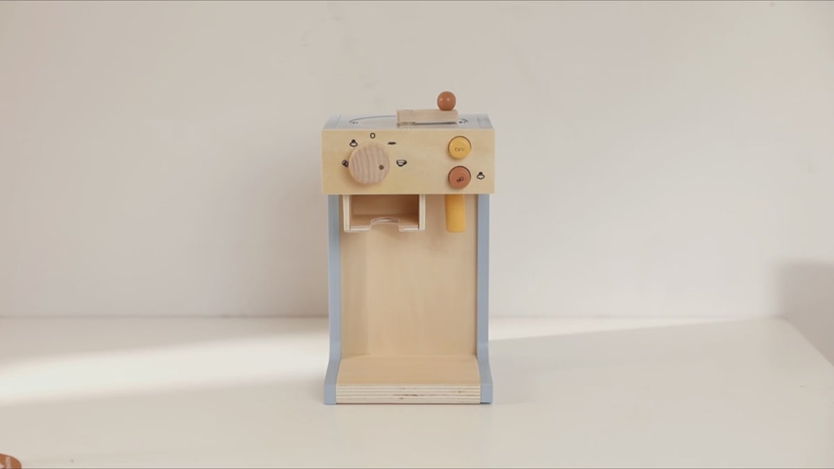 Showcase video of the wooden pretend barista coffee maker. Accessories are added one after another on the table, then hands demonstrate how to operate the toy coffee machine.